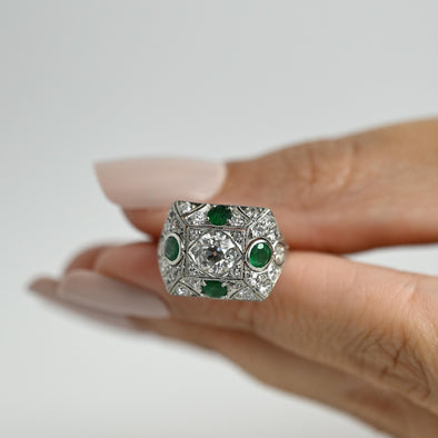 Circa 1901 Edwardian Platinum Old Mine Cut Center with Natural Emerald Accents