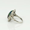 Edwardian Black Opal Cabochon and Diamond Halo Vintage Platinum Ring