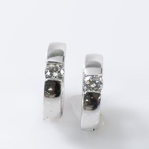 14k white gold huggie style Diamond earrings