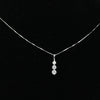 Timeless Three-Stone Diamond Necklace in White Gold