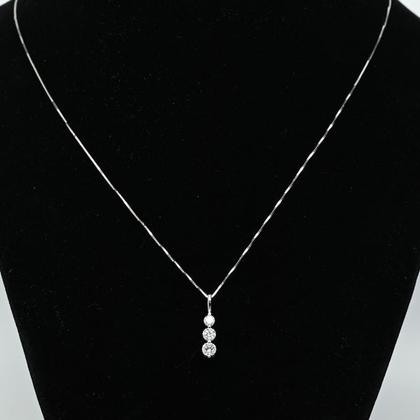 Timeless Three-Stone Diamond Necklace in White Gold