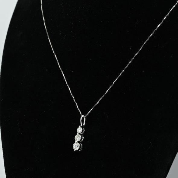 Timeless Three-Stone Diamond Necklace in White Gold