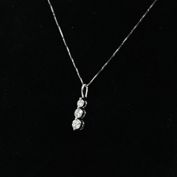 Timeless Three-Stone Diamond Necklace in White Gold