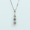 Timeless Three-Stone Diamond Necklace in White Gold