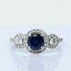 Blue Sapphire and Diamond Three Stone Halo 14k White Gold Ring