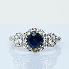Blue Sapphire and Diamond Three Stone Halo 14k White Gold Ring