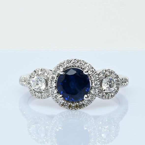 Blue Sapphire and Diamond Three Stone Halo 14k White Gold Ring