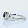 Blue Sapphire and Diamond Three Stone Halo 14k White Gold Ring