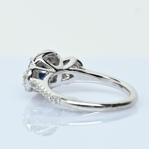 Blue Sapphire and Diamond Three Stone Halo 14k White Gold Ring