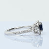 Blue Sapphire and Diamond Three Stone Halo 14k White Gold Ring
