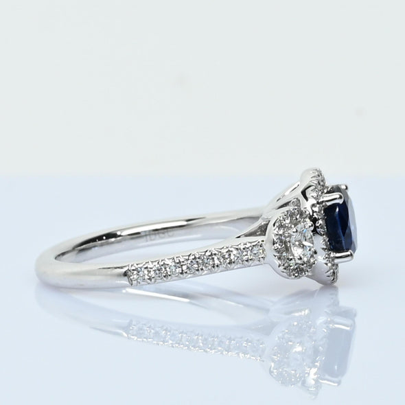 Blue Sapphire and Diamond Three Stone Halo 14k White Gold Ring