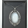 Edwardian 29ct Oval Moonstone Diamond Bow Motif Platinum Pendant