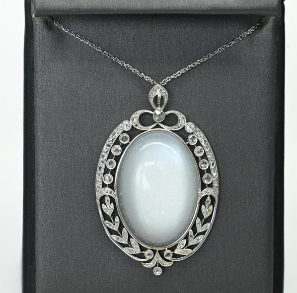 Edwardian 29ct Oval Moonstone Diamond Bow Motif Platinum Pendant
