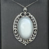 Edwardian 29ct Oval Moonstone Diamond Bow Motif Platinum Pendant