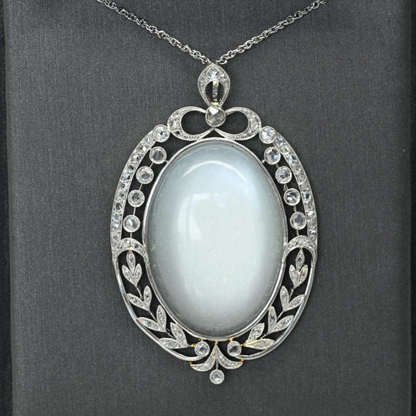 Edwardian 29ct Oval Moonstone Diamond Bow Motif Platinum Pendant