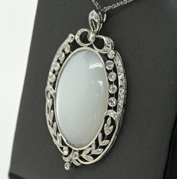 Edwardian 29ct Oval Moonstone Diamond Bow Motif Platinum Pendant