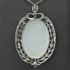 Edwardian 29ct Oval Moonstone Diamond Bow Motif Platinum Pendant