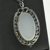 Edwardian 29ct Oval Moonstone Diamond Bow Motif Platinum Pendant