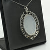 Edwardian 29ct Oval Moonstone Diamond Bow Motif Platinum Pendant