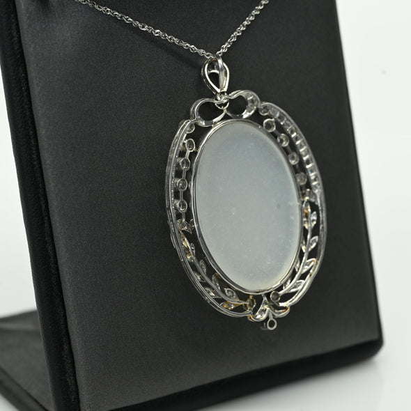 Edwardian 29ct Oval Moonstone Diamond Bow Motif Platinum Pendant