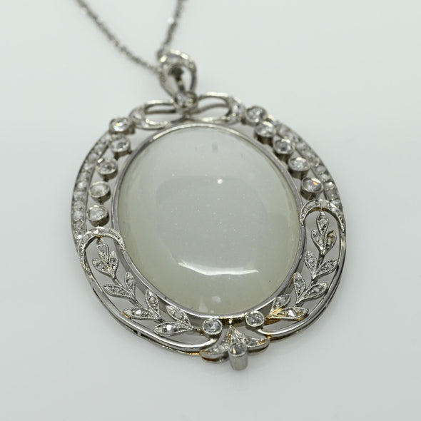Edwardian 29ct Oval Moonstone Diamond Bow Motif Platinum Pendant