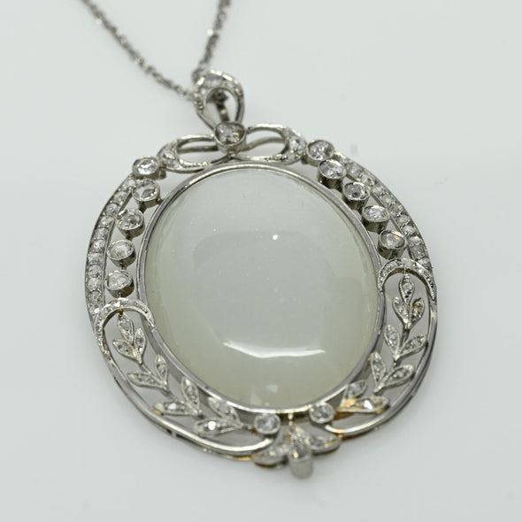 Edwardian 29ct Oval Moonstone Diamond Bow Motif Platinum Pendant