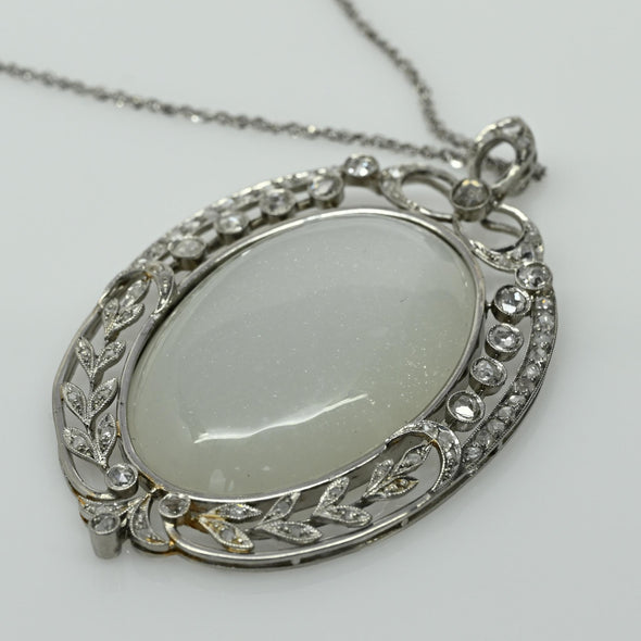 Edwardian 29ct Oval Moonstone Diamond Bow Motif Platinum Pendant
