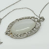 Edwardian 29ct Oval Moonstone Diamond Bow Motif Platinum Pendant