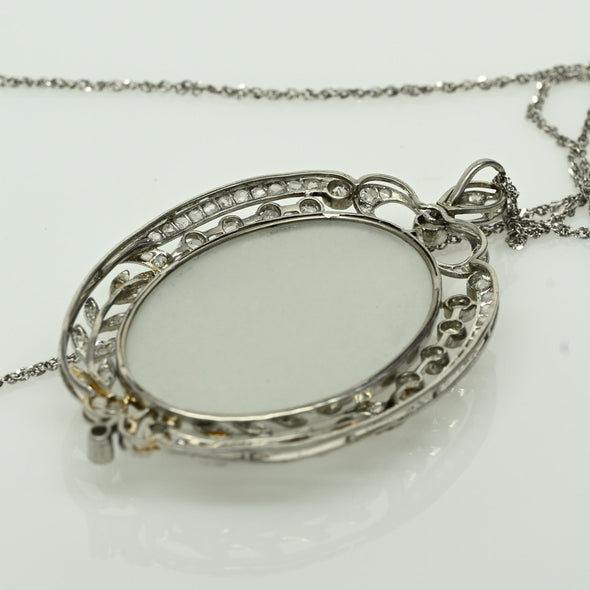 Edwardian 29ct Oval Moonstone Diamond Bow Motif Platinum Pendant