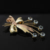 Tiffany Aquamarine Bow Brooch in 14K Rose and Yellow Gold