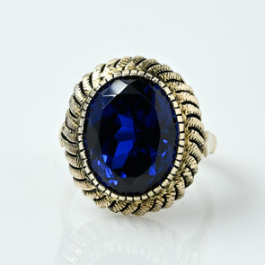 Vintage Blue Sapphire Oval Bezel Set Yellow Gold Ring