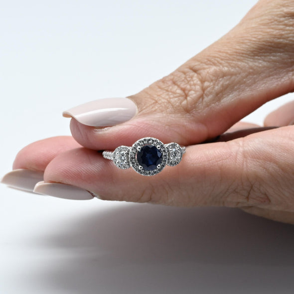 Blue Sapphire and Diamond Three Stone Halo 14k White Gold Ring