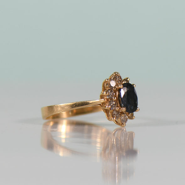 1.1ct Midnight Blue Sapphire Oval 0.33cttw Diamond Cluster 14K Gold Ring