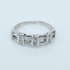 Elegant Platinum Diamond Band with Tapered Baguettes & Round Brilliants – 0.80ct