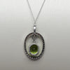 Peridot and Diamond Oval Pendant on 14k White Gold Necklace