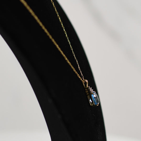 Blue Topaz Oval and Diamond Pendant on Chain in 14K Yellow Gold