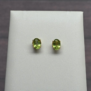 Peridot Oval Gemstone 14k Yellow Gold Stud Earrings