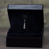 Timeless Three-Stone Diamond Necklace in White Gold