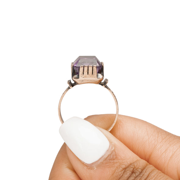 Victorian 10K Rose Gold Antique Purple Amethyst Fashion/Statement Ring in the hand highlighting the overall profile 