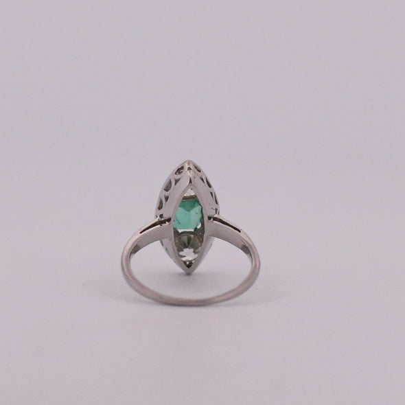 Circa 1920's Three Stone Navette Diamond and Colombian Emerald Ring