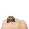 Victorian Two Tone 18K and Sterling Silver Antique Large Oval Citrine Cocktail/Statement Ring on the hand from the back highlighting the height 