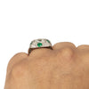 Edwardian Platinum Old Mine Cut Center with Natural Emerald Accents Vintage Statement Ring on the hand from the back showcasing the low profile and height 