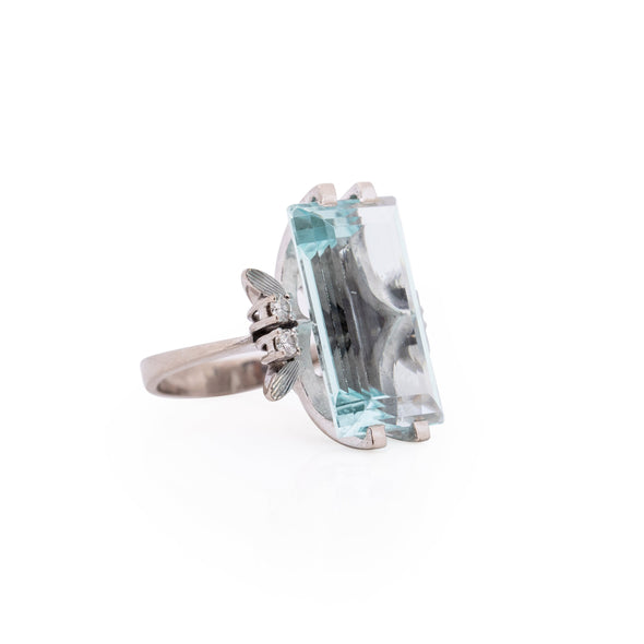 Vintage 18K White Gold 11.2 Ct Step Cut Aquamarine Cocktail Ring from the left showing diamond details 
