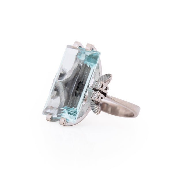 Vintage 18K White Gold 11.2 Ct Step Cut Aquamarine Cocktail Ring from the right showing prong settings 