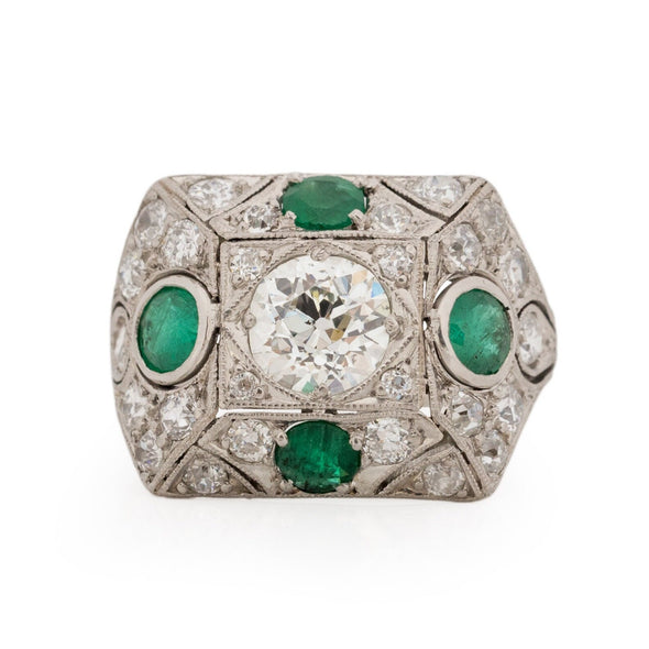 Circa 1901 Edwardian Platinum Old Mine Cut Center with Natural Emerald Accents
