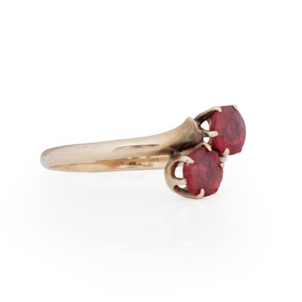 Victorian 10K Yellow Gold Red Ruby Doublet Vintage Toi et Moi Ring from the left showing tapered shank and prong setting 