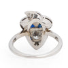 Edwardian 14K White Gold Old European Cut Diamond and Blue Sapphire Acorn Cocktail Ring from the bottom peaking under the gallery 