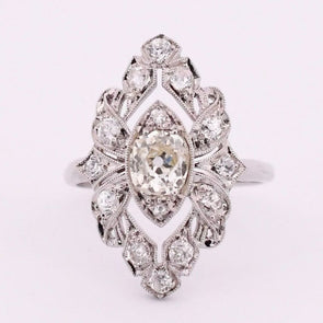 Edwardian Platinum TRAUB Floral 1.02Ct Old Mine Cut Diamond Antique Shield Ring from the front showing off the overall design 
