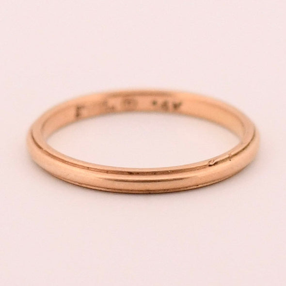 Art Deco 14K Yellow Gold Orange Blossom Smooth Finish Comfort Fit Mens Stackable Wedding Band from the front showing off the smooth finish of the band 